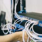 Server - Electronics Engineer Fixing Cables on Server