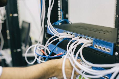 Server - Electronics Engineer Fixing Cables on Server