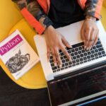 Software - Woman Programming on a Notebook