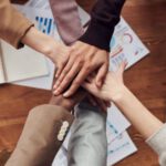 Teamwork - Photo Of People Near Wooden Table