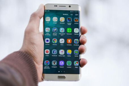 Mobile App - Person Holding Silver Android Smartphone