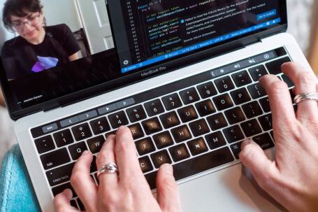 Technology - Person using Gray Laptop