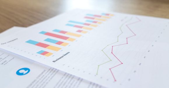 Analytics - Graph and Line Chart Printed Paper