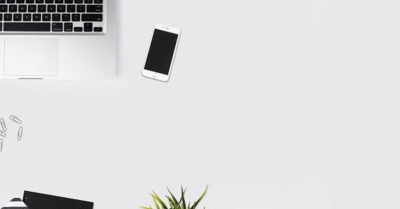 Technology - White Smartphone Beside Silver Laptop Computer