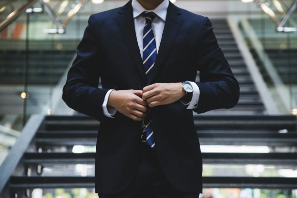 Career - person standing near the stairs