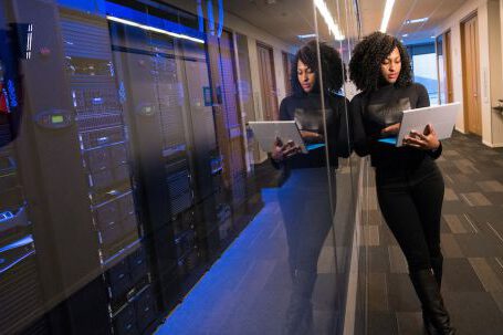 Server - Engineer Holding Laptop