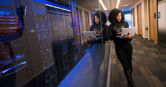 Server - Engineer Holding Laptop