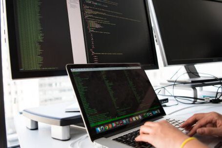 Software - Close-up Photo of Person typing on Laptop