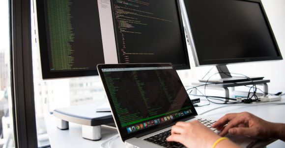 Software - Close-up Photo of Person typing on Laptop