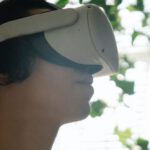 Virtual Reality And Augmented Reality - Amazed young guy exploring cyberspace in VR headset