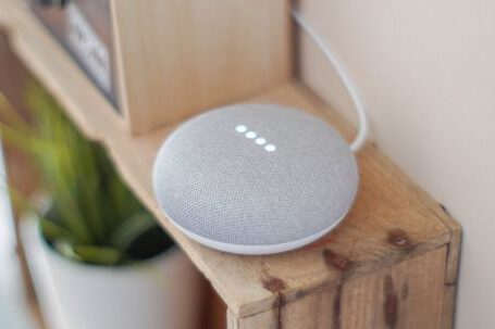 Smart Home - Round Grey Speaker On Brown Board