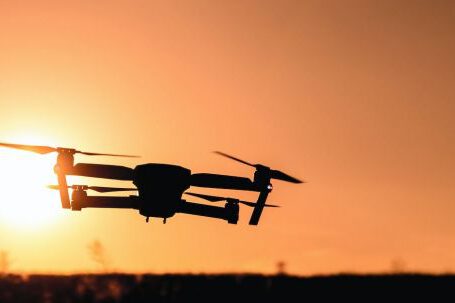 Quadcopter - Silhouette of Camera Drone Flew in Mid Air