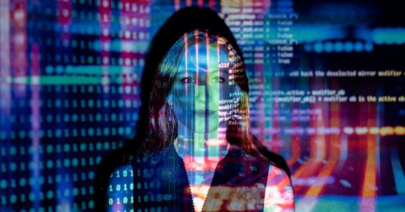 Technology - Code Projected Over Woman