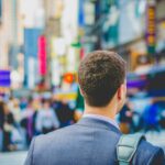 Career - shallow focus photography of man in suit jacket's back