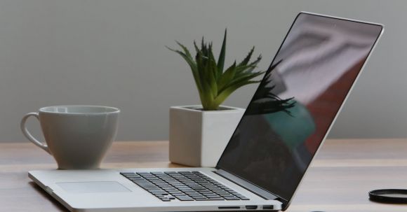 Technology - Silver Laptop and White Cup on Table