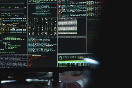 Cybersecurity - Close-Up View of System Hacking in a Monitor