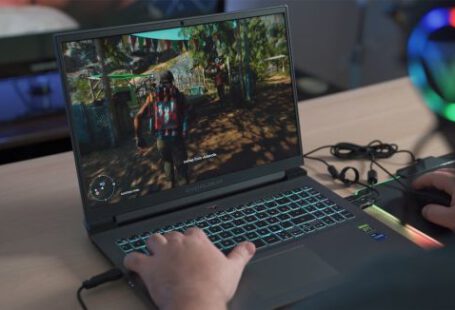 Pc - a person playing a video game on a laptop